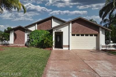 703 SE 11th PL CAPE CORAL, FL 33990