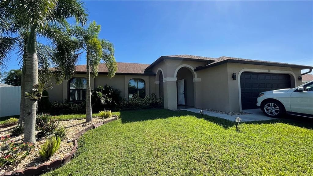221 NE 21st AVE CAPE CORAL, FL 33909