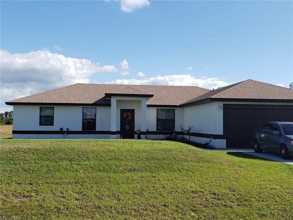 216 Pennfield ST LEHIGH ACRES, FL 33974