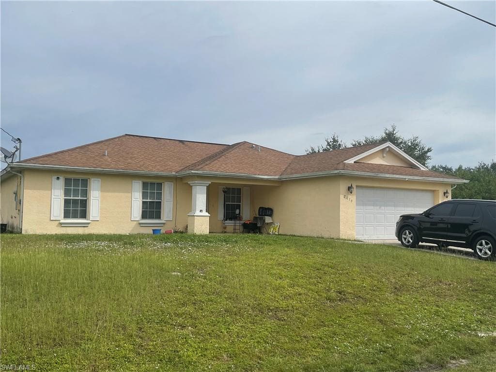2016 Wanda AVE N LEHIGH ACRES, FL 33971