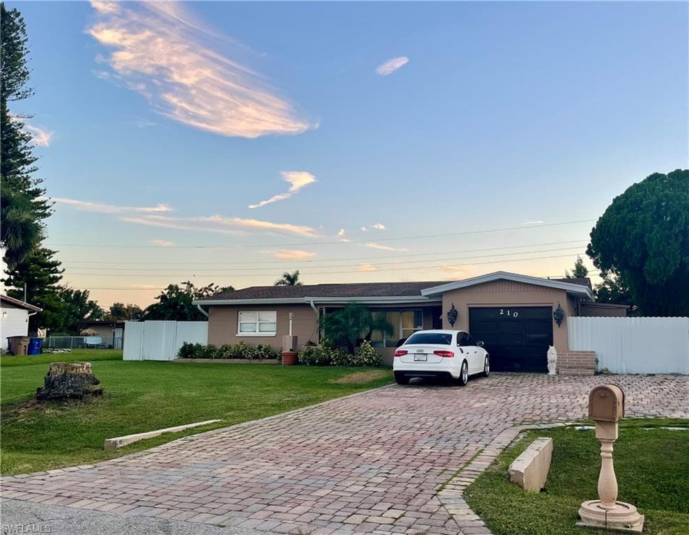 210 E Jasmine RD LEHIGH ACRES, FL 33936