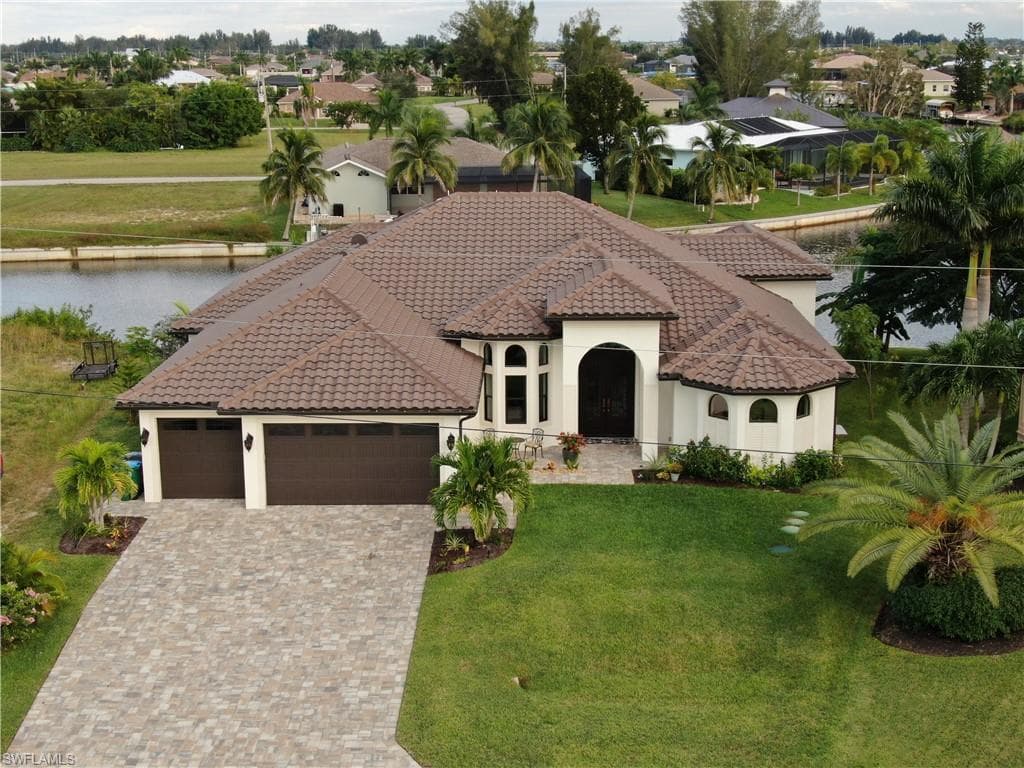 1003 NW 38th AVE CAPE CORAL, FL 33993
