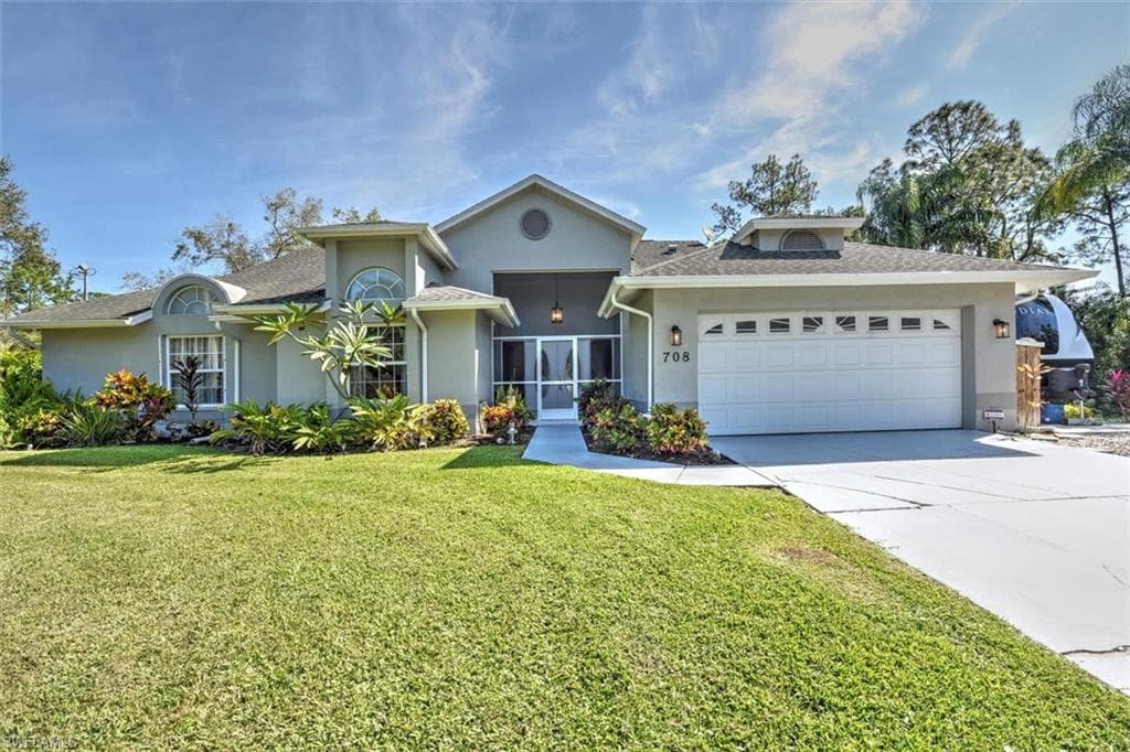 708 Grant AVE LEHIGH ACRES, FL 33972