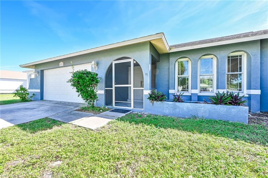 1233 SE 21st PL CAPE CORAL, FL 33990