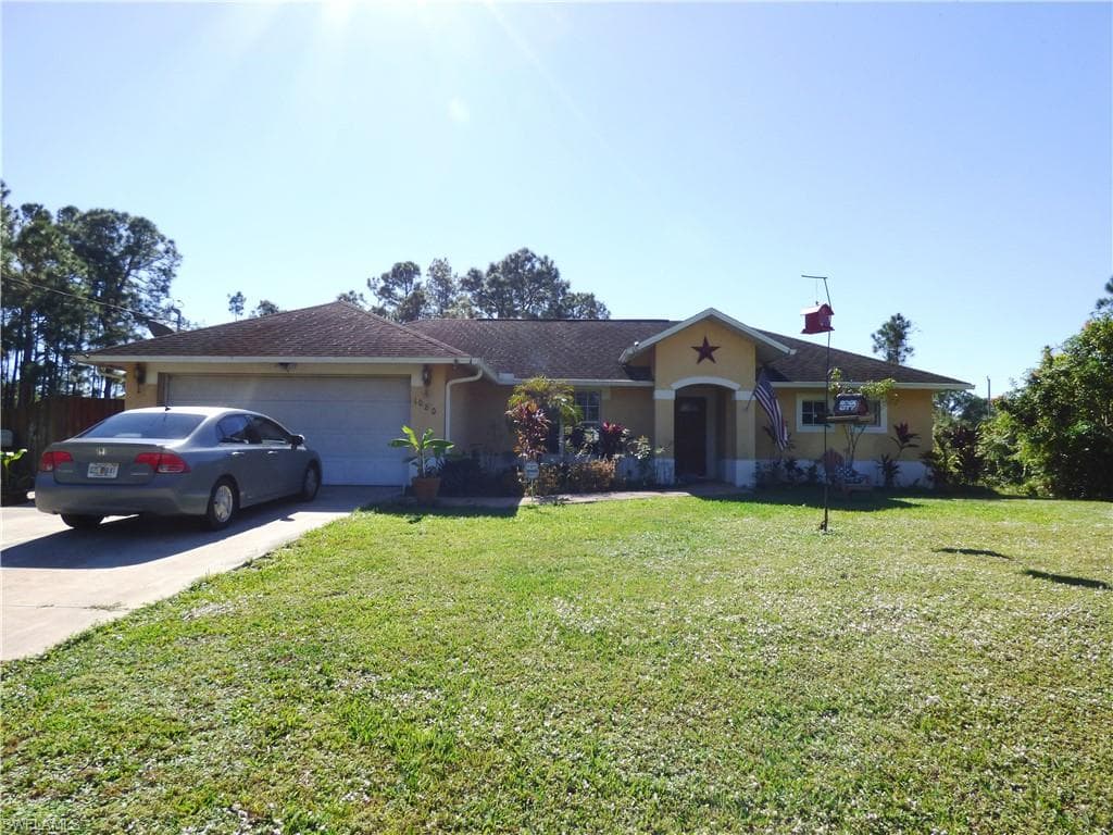 1080 Jaguar BLVD LEHIGH ACRES, FL 33974