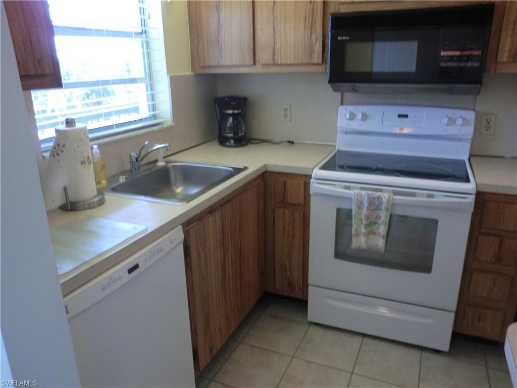 4380 27th CT SW 1-404 NAPLES, FL 34116