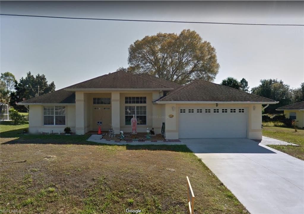 1406 Graham CIR LEHIGH ACRES, FL 33936