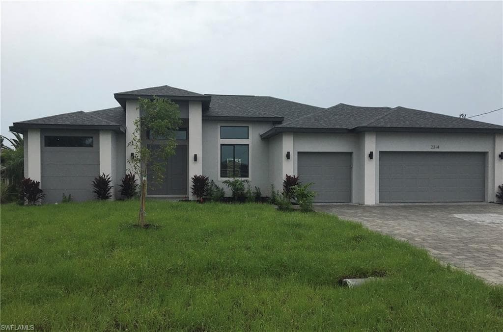 1245 SW 18th CT CAPE CORAL, FL 33991