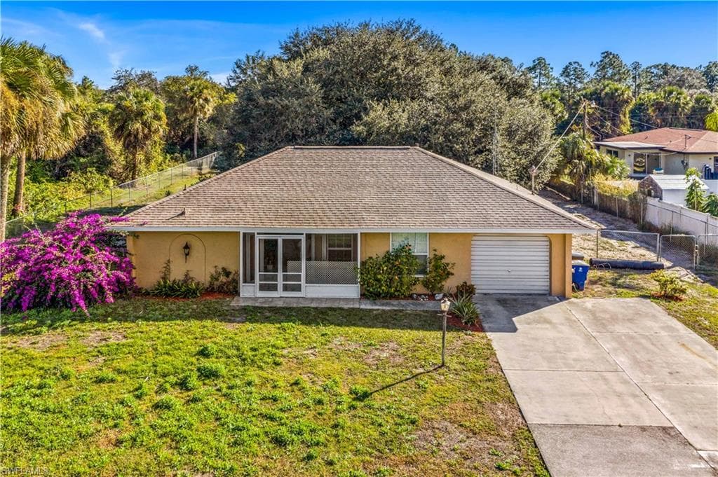 702 Washington AVE LEHIGH ACRES, FL 33972