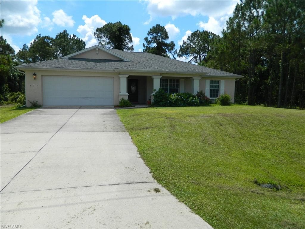 711 Fullerton AVE S LEHIGH ACRES, FL 33974