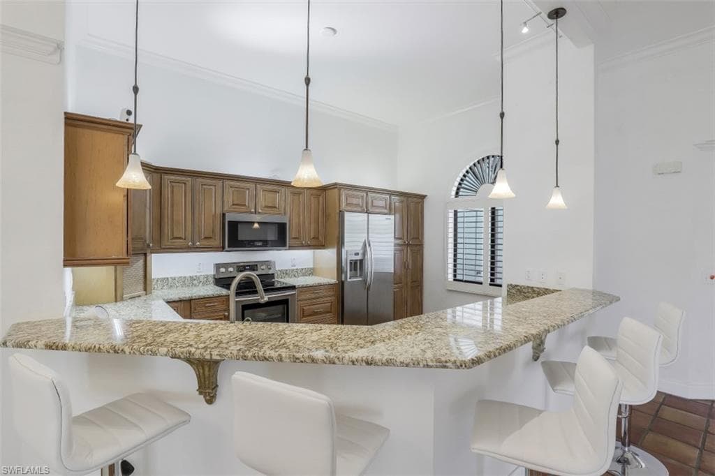 6535 VALEN WAY E-202 NAPLES, FL 34108