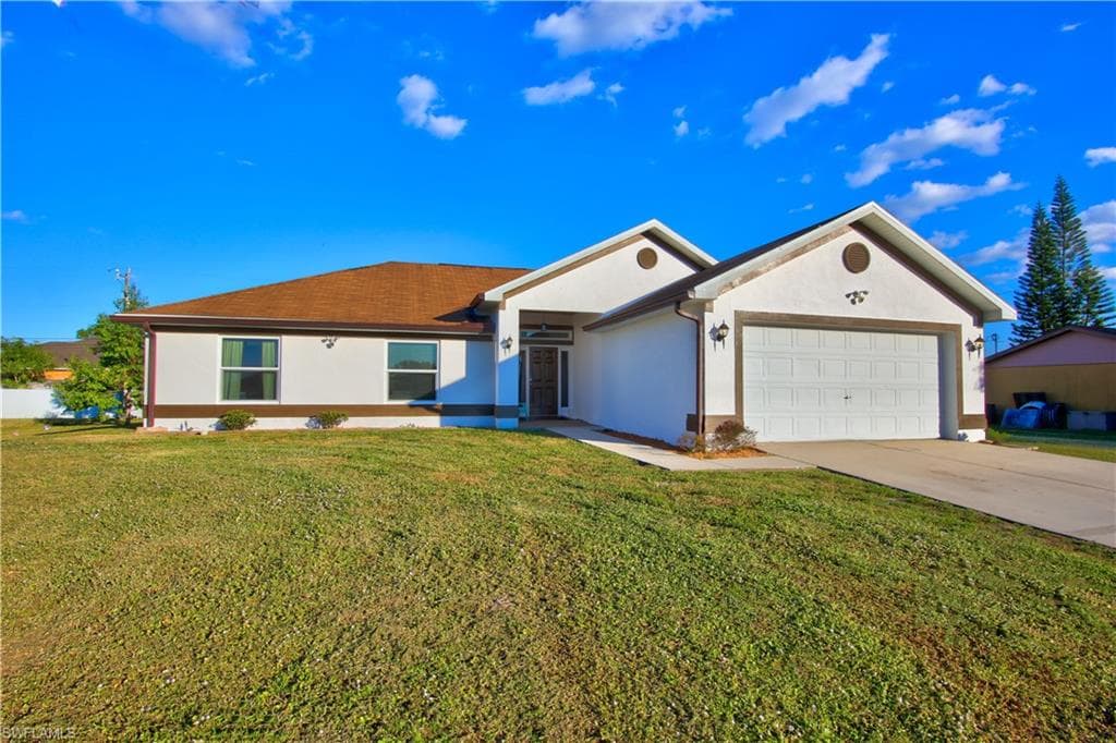 1227 NE 6th AVE CAPE CORAL, FL 33909