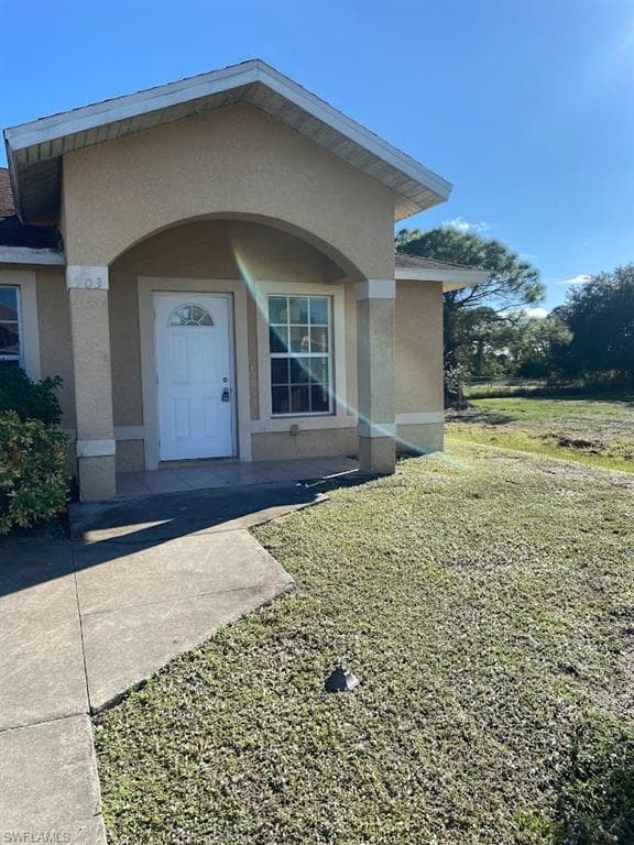 701/703 Jack AVE S LEHIGH ACRES, FL 33973