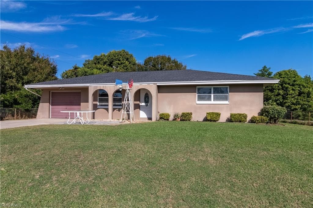 715 Buchanan AVE LEHIGH ACRES, FL 33936