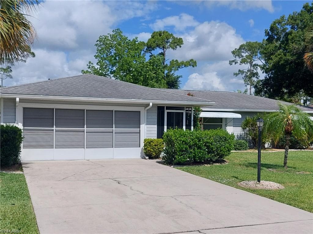 215 Jefferson AVE E LEHIGH ACRES, FL 33936