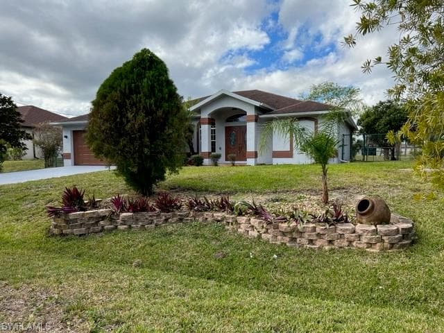 723 Spaulding ST E LEHIGH ACRES, FL 33974