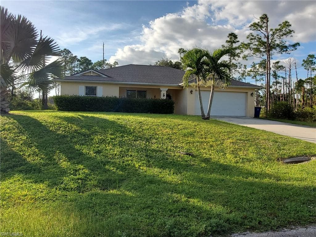 518 Aspen AVE S LEHIGH ACRES, FL 33974