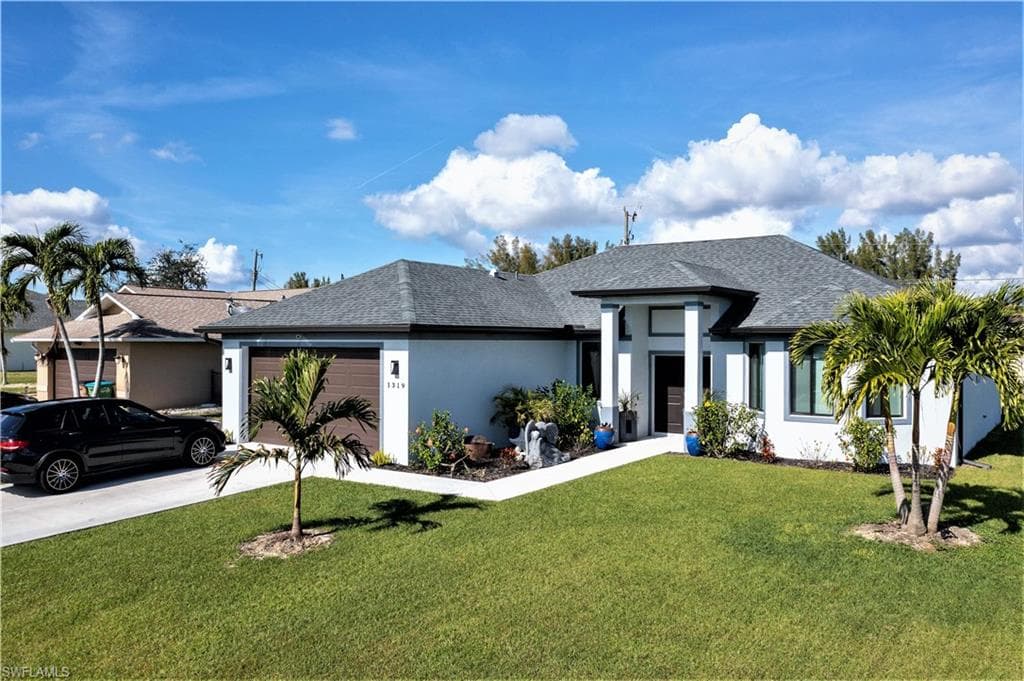 1319 SW 32nd TER CAPE CORAL, FL 33914