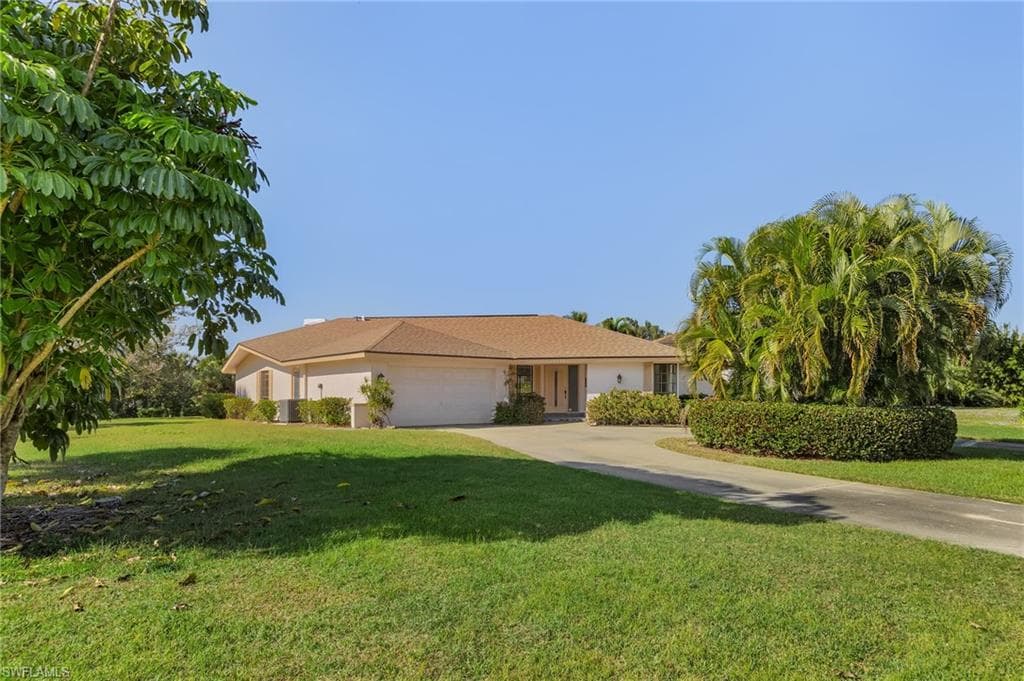 14295 Sandarac DR BOKEELIA, FL 33922