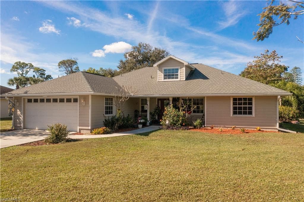 217 Greenwood AVE W LEHIGH ACRES, FL 33936