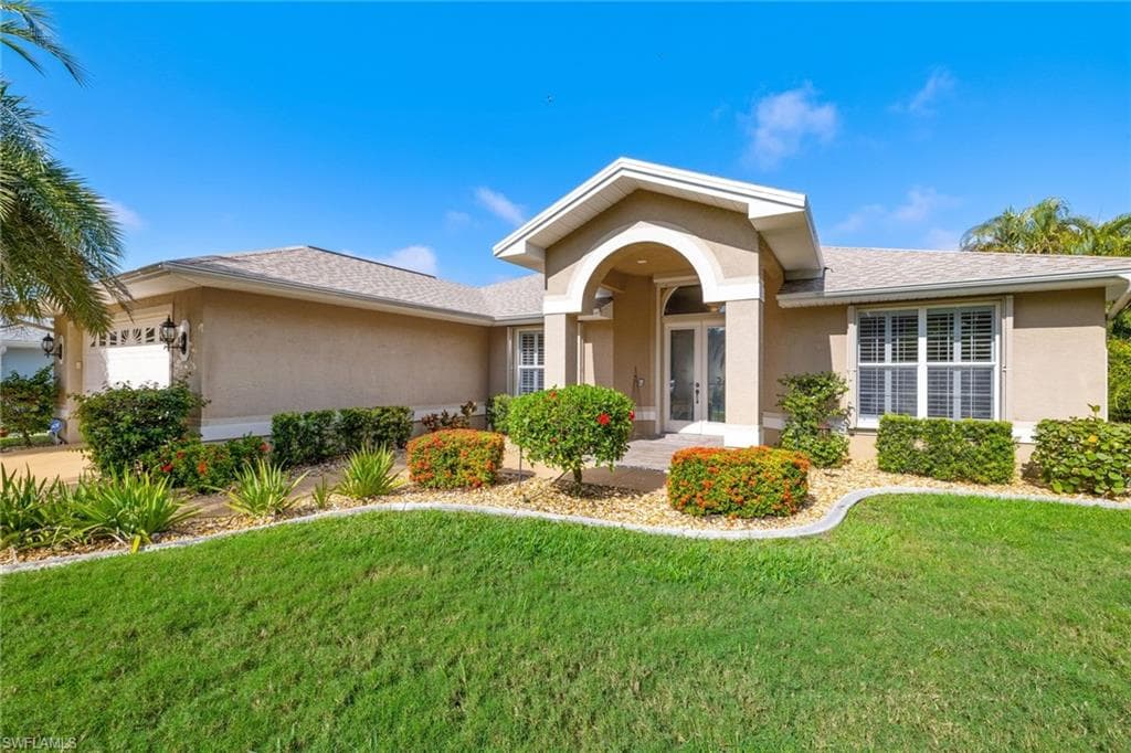 3311 SW 8th ST CAPE CORAL, FL 33991