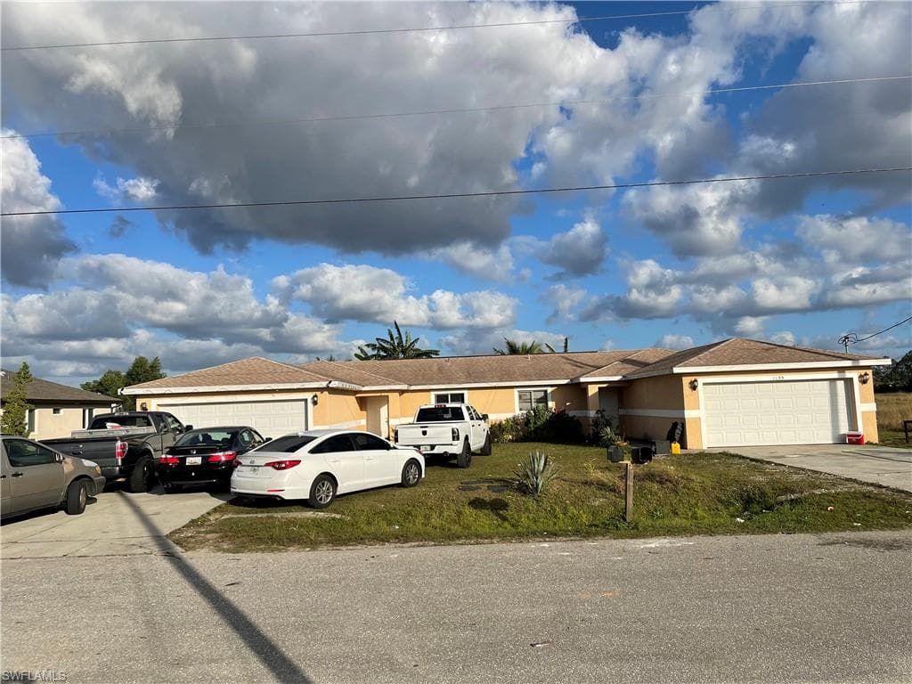 1133/1135 Hightower AVE S LEHIGH ACRES, FL 33973