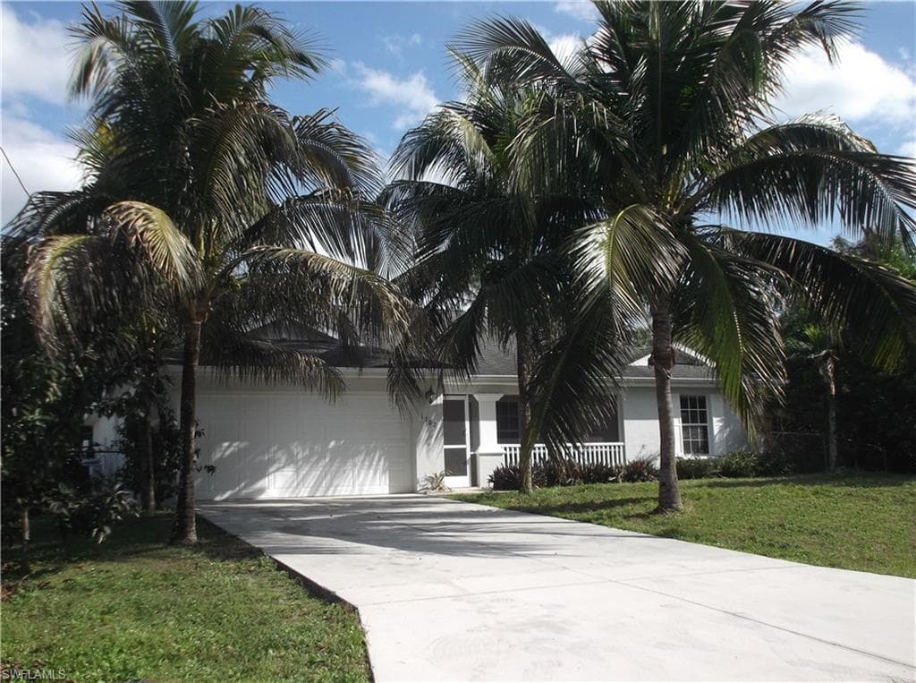 1702 Ann AVE N LEHIGH ACRES, FL 33971