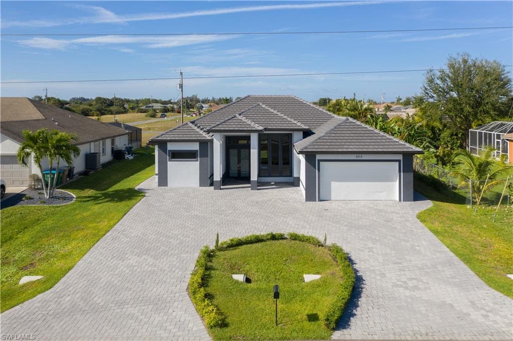 604 NW Juanita PL CAPE CORAL, FL 33993