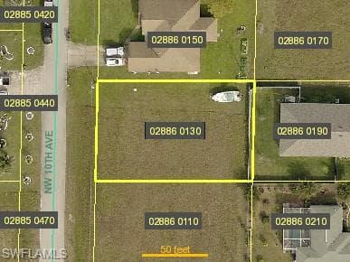 1411 NW 10th AVE CAPE CORAL, FL 33993
