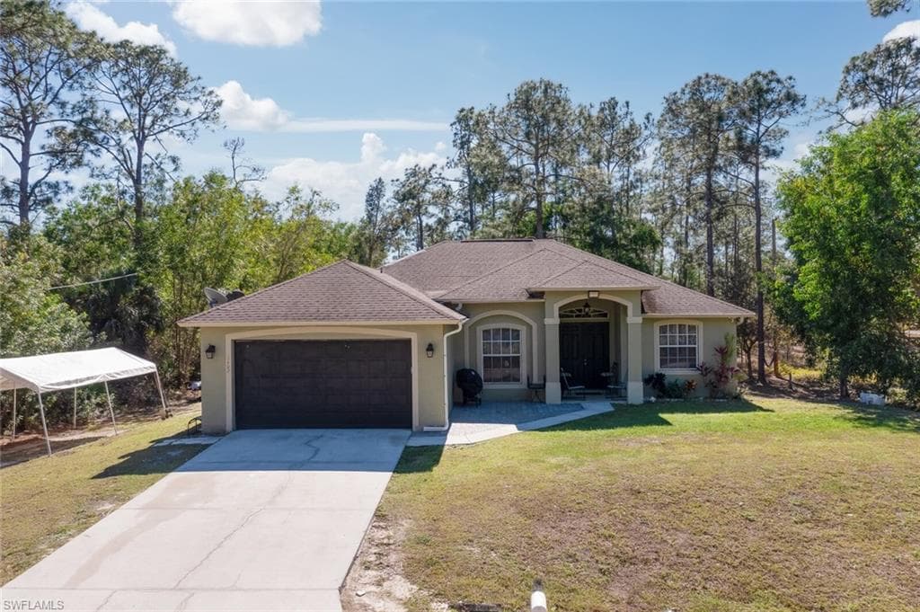1402 E 11th ST LEHIGH ACRES, FL 33972