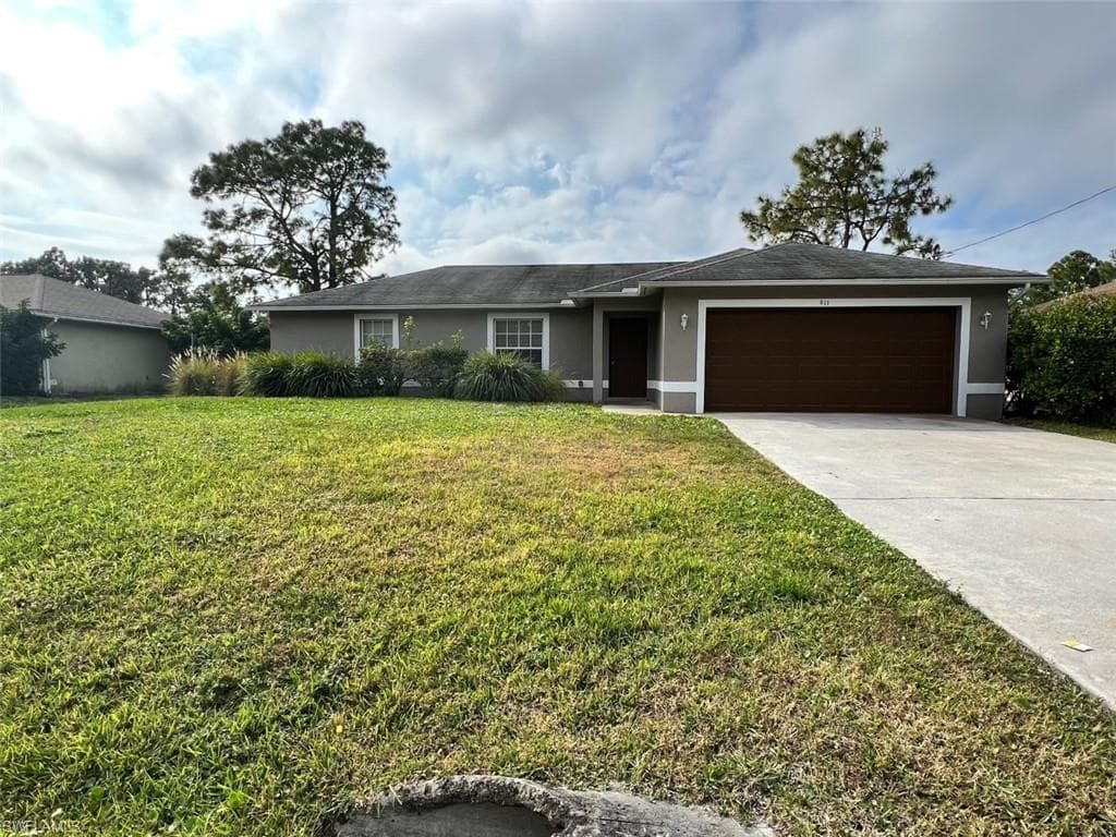 911 Anza AVE LEHIGH ACRES, FL 33971