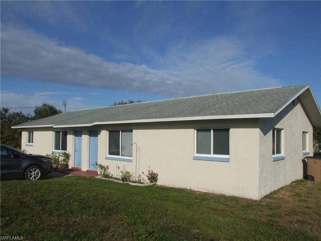 725/727 Harry AVE S LEHIGH ACRES, FL 33973