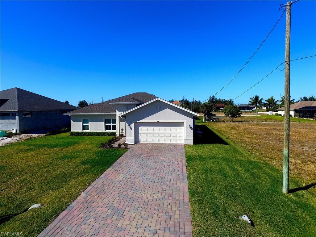 1648 NW 37th AVE CAPE CORAL, FL 33993