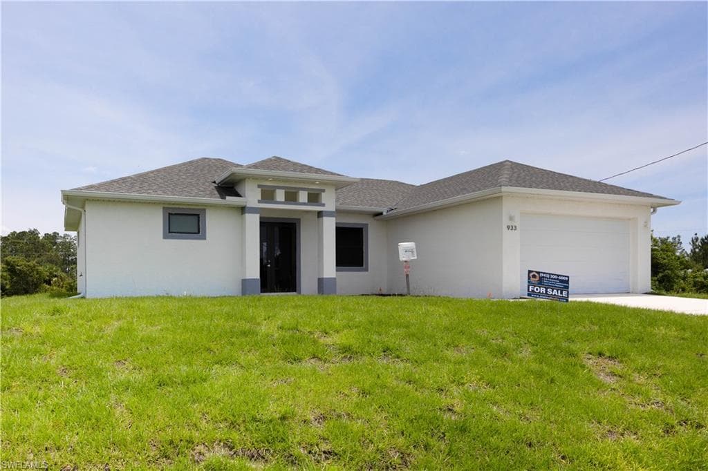 933 Oxford AVE S LEHIGH ACRES, FL 33974