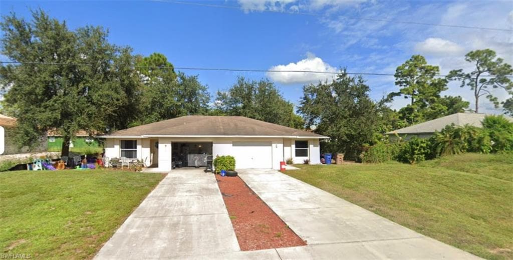 121 Meadow RD LEHIGH ACRES, FL 33973
