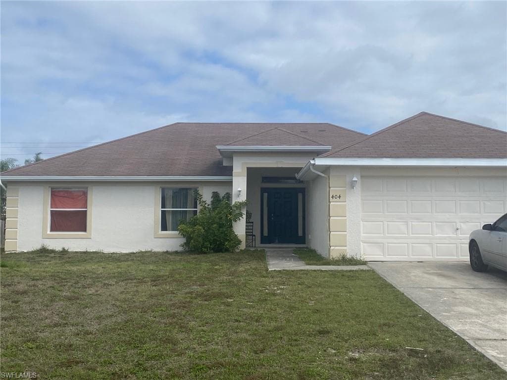 404 Willowbrook DR LEHIGH ACRES, FL 33972