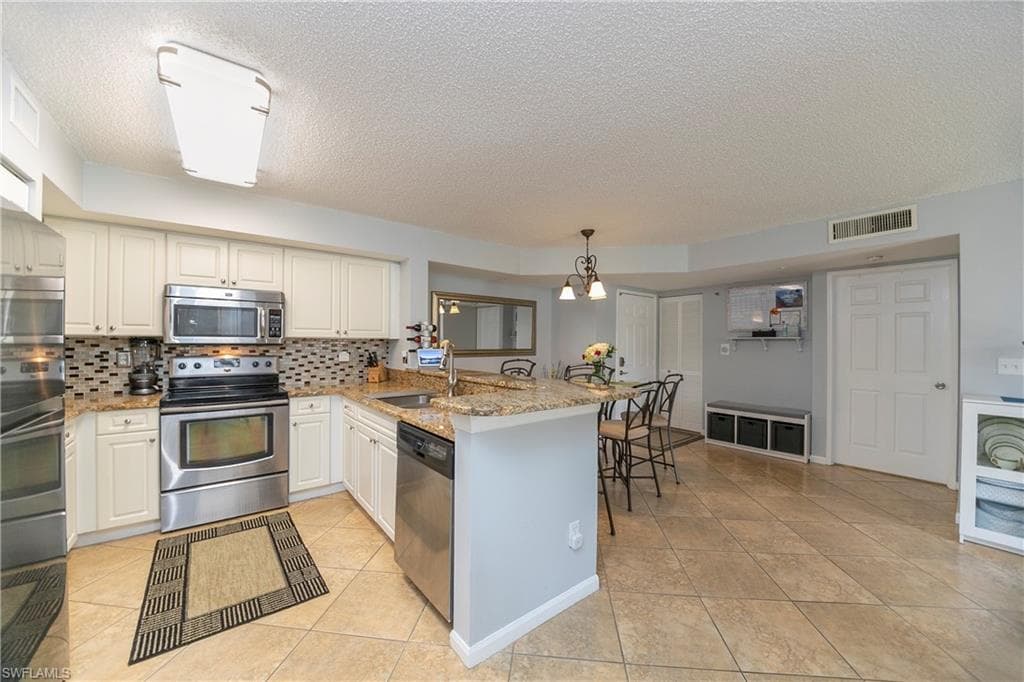1265 Wildwood Lakes BLVD 3-103 NAPLES, FL 34104