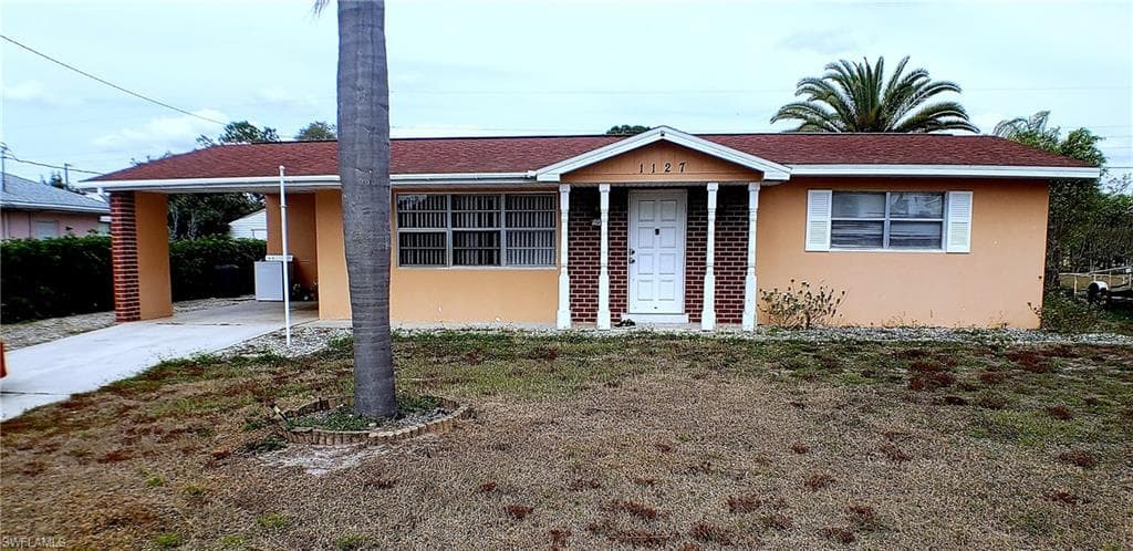 1127 Gifford AVE N LEHIGH ACRES, FL 33936