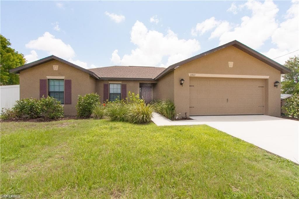 2203 SW 11th CT CAPE CORAL, FL 33991