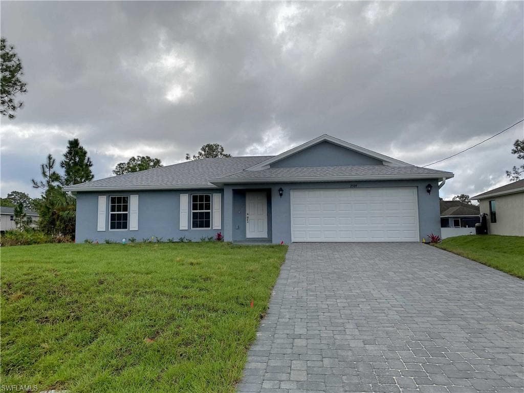 2509 34th ST SW LEHIGH ACRES, FL 33976