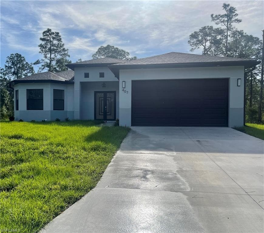 407 W 10th ST LEHIGH ACRES, FL 33972