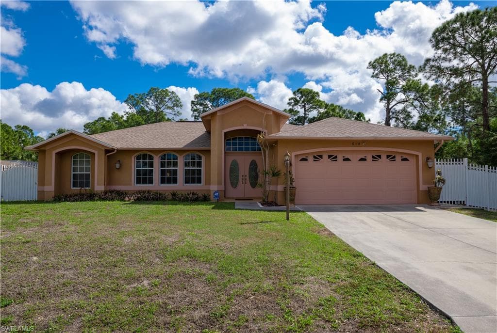 614 Henry AVE LEHIGH ACRES, FL 33972