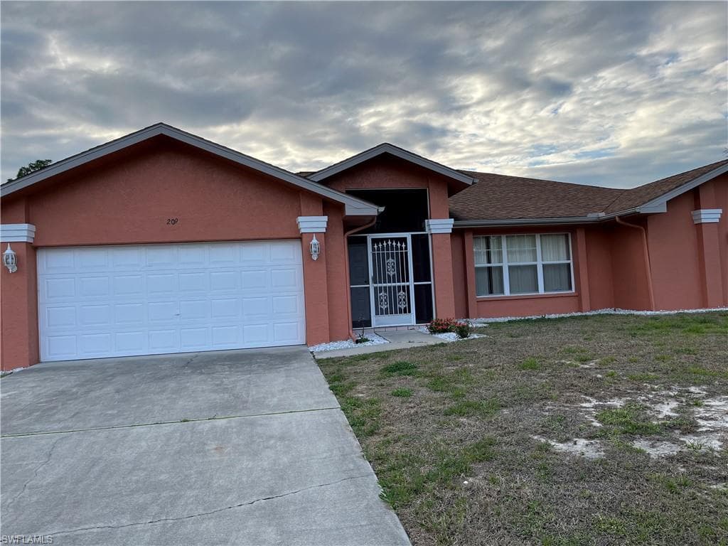 209 Mcarthur AVE LEHIGH ACRES, FL 33936