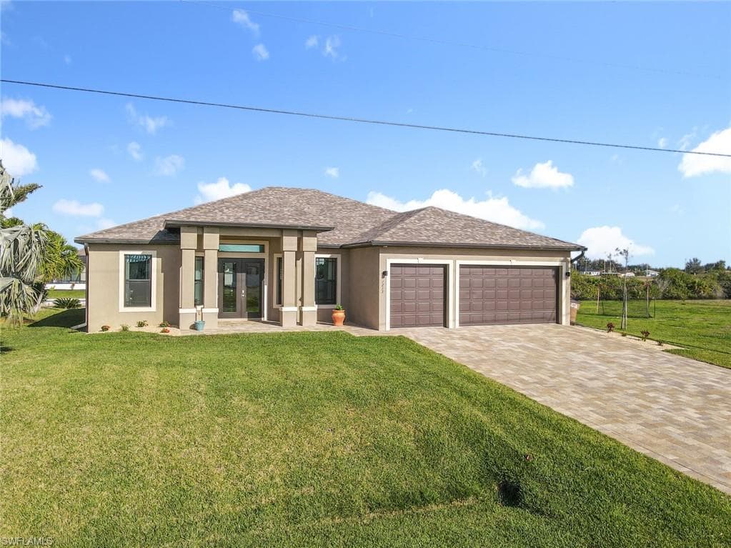 1233 NW 33rd AVE CAPE CORAL, FL 33993