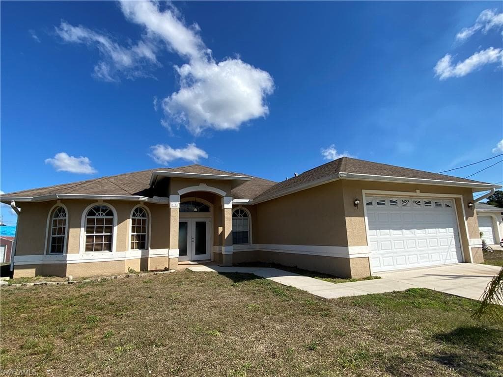 3102 13th ST W LEHIGH ACRES, FL 33971