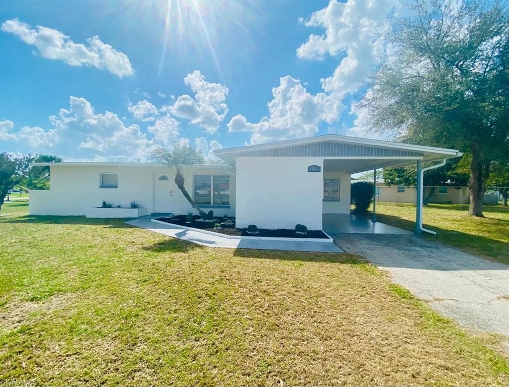 1104 E Jasmine RD LEHIGH ACRES, FL 33936