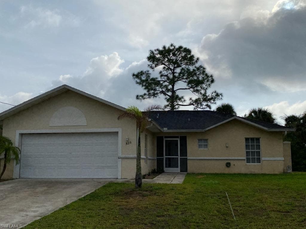 525 Oakfield AVE LEHIGH ACRES, FL 33974