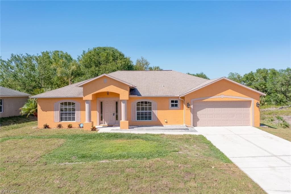3102 10th ST W LEHIGH ACRES, FL 33971