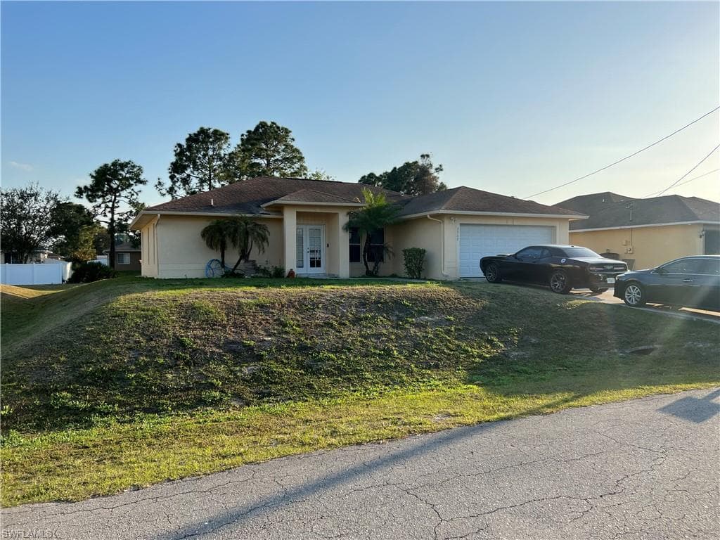 3313 20TH ST W LEHIGH ACRES, FL 33971