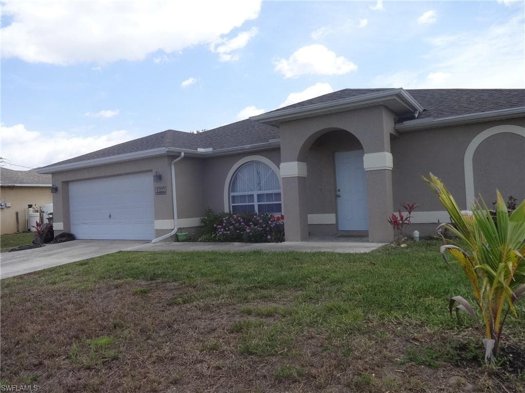 1227 NE 12th PL CAPE CORAL, FL 33909